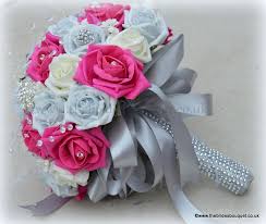 We did not find results for: Brides Bouquet Of Roses In Hot Pink Silver And Ivory Foam Roses With Brooches And Rhines Wedding Bouquets Pink Pink Silver Weddings Silver Wedding Decorations