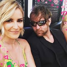 Jon Moxley Renee Paquette and baby Nora.