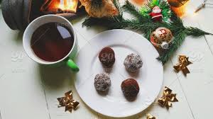 Found in these states california arizona. Christmas Toys A Cup Of Hot Tea Cake And Christmas Tree Garland On A White Table Stock Photo 1cf033e1 9be4 4708 944b 623093121f9e