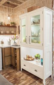 We offer 16 door styles and finishes, with a complete line of accessories. Freestanding Furniture Piece In Glacier Goes Perfectly With The Hazelnut Charcoal Staine Semi Custom Kitchen Cabinets Custom Kitchen Cabinets Wellborn Cabinets