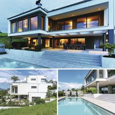 Luxus Villa Modern In Hanglage Mit Flachdach Pool Terrasse Bauen Haus Design Ideen Bauhausstil Luxus Fertighaus Haus Architektur Architektur Haus Design