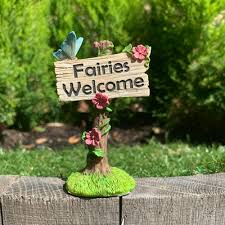 If attracting fairies is your goal, there are lots of things you can do to create a fairy friendly environment. Fairies Welcome Fairy Garden Sign Fairy Garden Shop Fairy Sign