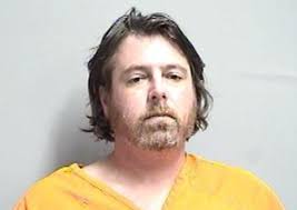 Earlham man arrested for allegedly strangling woman