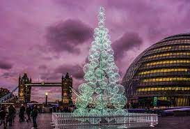A Blend Of Old World Design With Modern Architecture Tower Bridge And The London City Hall Captured Against A Purple Cloudy Cloudy Nights London City Landscape