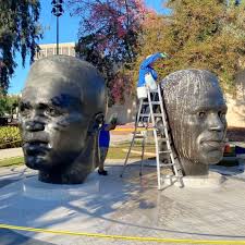 The iconic Pasadena Robinson Memorial, located at 95 N Garfield Ave across  from City Hall, is looking clean and fresh following recent artwork  conservation. The monumental bronze sculptures depicting Mack and Jackie
