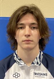 Trojan girls, wrestlers handed defeats