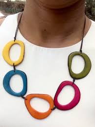 The Margarita Necklace Is Made Of A Natural Seed Which Is Called Tagua And Cotton Strands It Has An Easy S Polymer Clay Necklace Clay Jewelry Clay Jewelry Diy