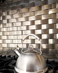 To find out if a stacked stone backsplash will work in your kitchen, take a peek at these stylish examples. Solid Bronze Tile Backsplash Over Stove Traditional Kitchen Other By Rocky Mountain Hardware Houzz Uk