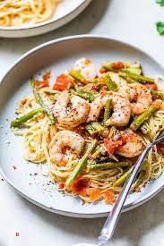 Angel Hair With Shrimp And Asparagus Is A Quick And Easy Pasta Dish Made With Fresh Tomatoes And Asparag In 2020 Cooking Light Recipes Easy Pasta Dishes Seafood Dinner