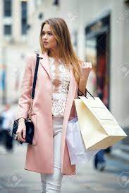 Beautiful Woman Walking On New York City Street With Bags After She Shopping Stock Photo Picture And Royalty Free Image Image 59948045