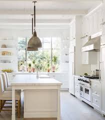 Rustic White Kitchen With Brass Pendants Via Velvet And Linen Uptown On A Budget Rustic Farmhouse Kitchen Modern Farmhouse Kitchens Farmhouse Kitchen Decor