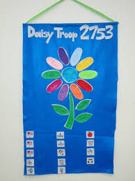 kaper chart with girls names as petals on felt daisy girl