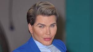 guy looks like ken doll