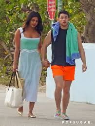 Both wore traditional indian clothes. Priyanka Chopra Blue Dress Miami With Nick Jonas Popsugar Fashion