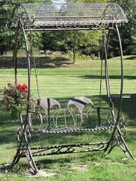 Swings Can Fit In All Types Of Garden Spaces From Secluded Spots To Front And Center Garden Swing Garden Swing Design