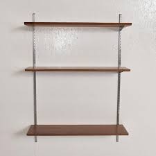 Inspired by modern design, the bekx utilizes a capsule shape in its two shelves and two shelf ring brackets, giving it a look that stands out on your wall while creating a decorative storage area. Mid Century Modern Bookcase Shelving Wall Unit One Bay Walnut Aluminum Eames For Sale From 30th July To 31st August Bidsquare