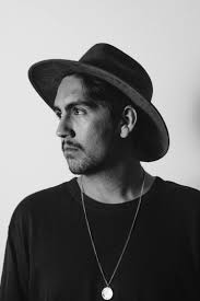 Man wearing black fedora hat photo