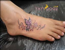 Butterfly Tattoos On Foot Butterfly Foot Tattoo Tattoo Designs Foot Foot Tattoos