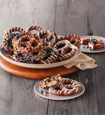 Drenched in creamy dark chocolate but with the fun crunch of pretzels. Celebrate Chocolate Covered Pretzels Harry David