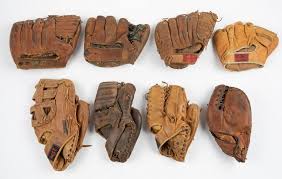 What are the most expensive baseball gloves? Lot Art 8 Vintage Baseball Gloves