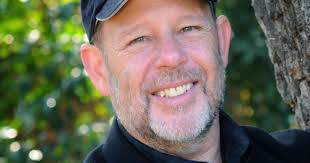 Neustadt stresses administrative experience, background as teacher