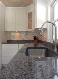 Our Renovated Kitchen Is Done Blue Pearl Counters Artisan Faucet White Marble Subway Til Granite Kitchen Blue Granite Countertops Kitchen Tiles Backsplash