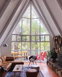 You Have Unobstructed Views Of Huge Floor To Ceiling Windows That Look Out Onto The Trees Perfectly Frame A Frame Cabin Floor To Ceiling Windows A Frame House