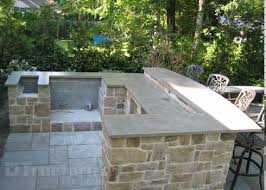 There are several ways to completely transform your current laminate surfaces on the cheap. Outdoor Bar With Concrete Countertop Outdoor Ideas Patio Outdoor Kitchen Countertops Outdoor Kitchen