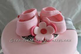 Once i gave her the cookies she was going to put string through the hole with a tag attached to it to finish them. Cool Shabby Chic Baby Shower Cake