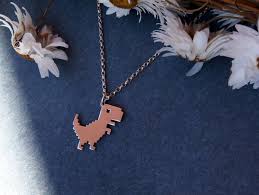 Google dinosaurio. Dinosaurio cromado. Joyas de dinosaurios. - Etsy España