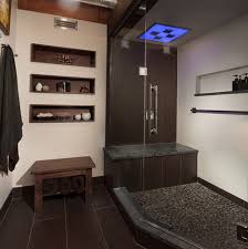 Stadium lighting, large murals and a corner bar complete this winning space. Man Cave Bathroom Chi Renovation Design