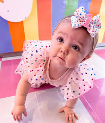 Our big 1 year old had the best day today! 💗🧁 THANK YOU FOR THE CUTEST  BIRTHDAY DRESS from @minioliestore 💓 THANK YOU FOR HER BIRTHDAY BOW  @kokominibows 💝 Stroller: @unilove_global 💞