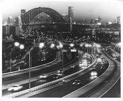 Warringah Expressway A Night Time View Of Sydney With The Unusual Outline Of The World Famous Harbour Bridge Loomin Sydney Harbour Bridge Harbor Bridge Photo