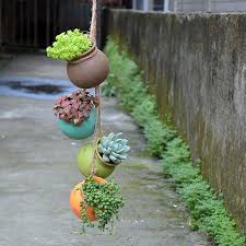 Terracotta style planters are a popular choice because of their rustic charm and durability. Flower Pot Terracotta Hanging Planter Pots For Flowers Plant Garden Flowerpot Buy At The Price Of 39 90 In Aliexpress Com Imall Com