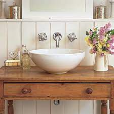 When we were planning our bathroom renovations, one thing i was sure of, was that i wasn't going to be buying a modern vanity unit. Repurposing Furniture As A Bathroom Sink Vanity Modernize