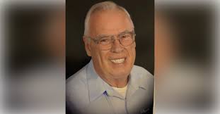 Obituary information for John William Traubert, MD