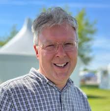 This used to be our "lawn".....just plain grass....But we decided last year  to dig out some areas of it and scatter some wild flower seeds. .so as to  encourage nature and attract