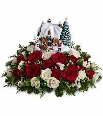One of our best selling flower centerpieces from previous holiday seasons, the new version for 2017 comes with a fun and newly created village figurine keepsake. Thomas Kinkade Santa S Workshop By Teleflora Hamden Ct Florist