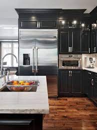 Expect to spend between $2,000 and $5,000 to have your kitchen cabinets professionally painted. 30 Trendy Dark Kitchen Cabinet Ideas Forever Builders San Diego