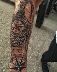 This nautical tattoo boasts realistic shading and makes for an excellent choice for an arm sleeve. Compass Tattoo To Give You Direction Guide For 2021 Tattoo Stylist