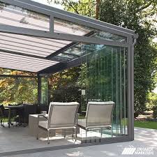 Auch Als Raumteiler Lassen Sich Erhardt Ganzglas Schiebeelmente Einsetzen Terrassen Dach Terrassendach Terrassenuberdachung
