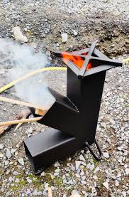 A rocket stove is a type of stove that has a cylinder shape and uses a vertical combustion chamber to preserve heat. Made A Little Rocket Stove 90mm Box Removable Grate Too Welding