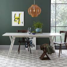 The second round model in this review, this modern coffee table is a blend of modern tubular designs with the elegant and simplistic designs of the victorian era. Parker Mid Century White Expandable Dining Table