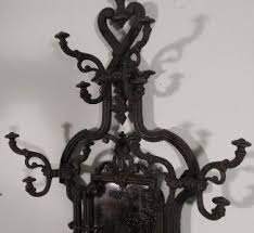 There is no visible signature but many details in the crazy iron works can bring to attribute to edgar brandt master. French Antique Cast Iron Hall Tree Hat Coat Rack Stand On Popscreen