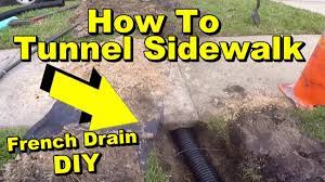 Maybe you would like to learn more about one of these? How To Tunnel A Sidewalk French Drain Pipe Under Walk With Pop Up Emmiter Youtube