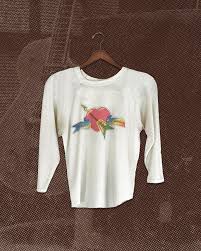 The super soft, distressed Classic Logo Raglan Tee, originally released for  The Hard Promises Tour in 1981, is now available in the Tom Petty Store.  Tom Petty Nation member Susan McAfee Shires