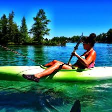 Kayaking gives you the freedom to explore lakes and coasts. Kayaking On Torch Lake Michigan Adventures Michigan Vacations Torch Lake