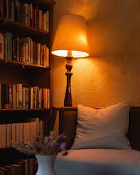 Soft lighting, a cozy armchair, and a good book. This is the pure  relaxation you can experience in our library!