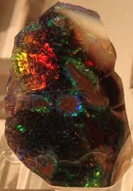 Precious Opal From Virgin Valley Nevada On Display At The 2012 Tucson Gem Mineral Show In Arizon Gems And Minerals Minerals And Gemstones Crystals Minerals