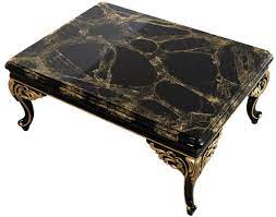Rendered in two tones with leaf design on legs this occasional table brings the feeling of. Casa Padrino Luxury Baroque Coffee Table Black Gold 110 X 84 X H 48 Cm Ornate Living Room Table Living Room Furniture In Baroque Style